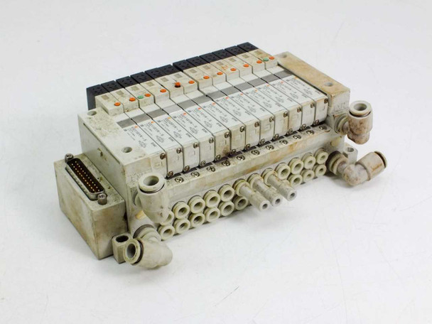 SMC solenoid valve manifold assembly with 2x VQ1201N-5 and 10x VQ1101N-5 valves and DB-25 port – three-quarter front view