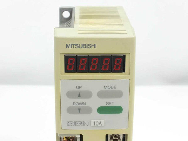 Mitsubishi MR-J10A MELSERVO-J — front panel close-up showing 5-digit red LED display and UP/DOWN/MODE/SET buttons with green SET key