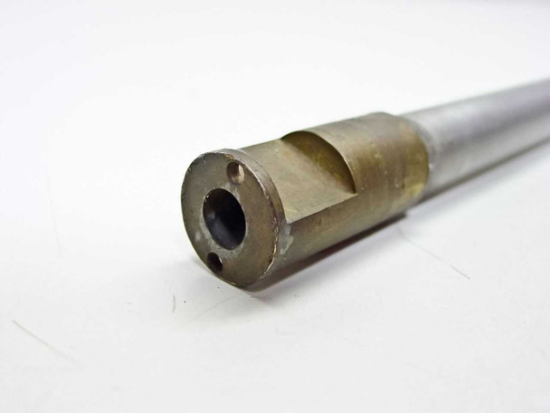 Vacuum chamber electrical feedthrough tube – close-up of opposite flanged end showing 1/4 inch ID bore, bolt holes, and brass/bronze collar