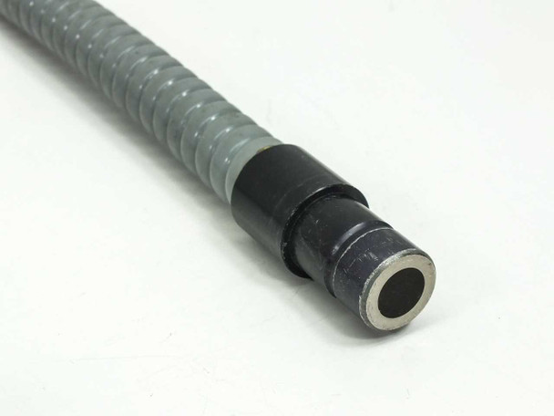 Volpi fiber optic cable — close-up of input light tip end showing black connector and fiber bundle face, approximately 15mm diameter
