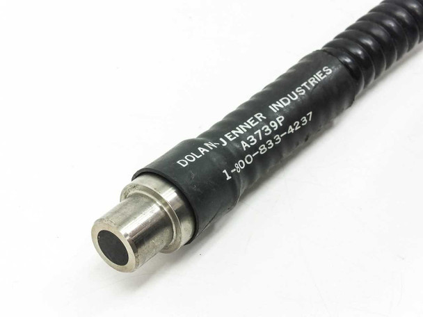 Close-up of Dolan-Jenner A3739P input light tip showing cylindrical metal tip with part number A3739P and phone number printed on armored cable sheath