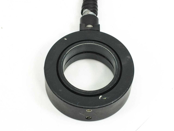 Close-up of Dolan-Jenner A3739P black anodized ring mount showing 82mm OD ring and central 51mm ID opening, cable connection at top