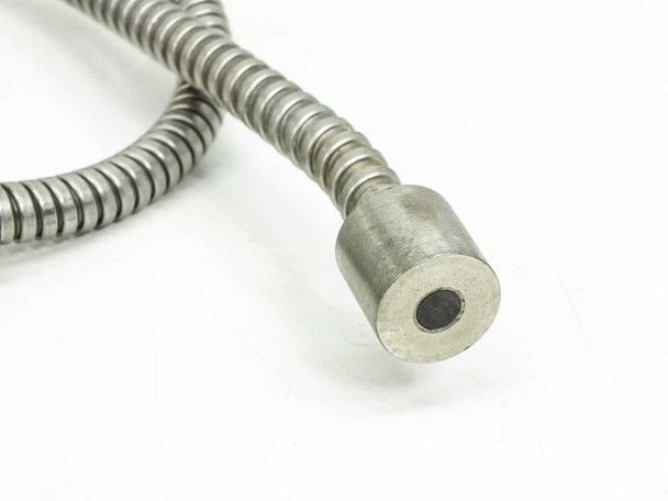 Close-up of the chrome threaded output tip showing the fiber bundle aperture and 0.25-threaded shaft end for attaching dispersing lenses