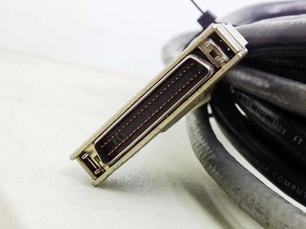 Integral Vision OMNI LD.400MM interconnect cable — close-up of high-density SCSI-style multi-pin connector on system cable