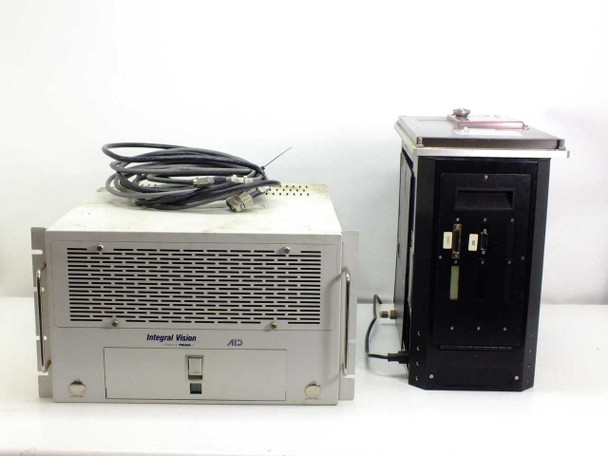 Integral Vision OMNI LD.400MM machine vision controller unit (front) and camera enclosure (right) — front view showing Integral Vision AID branding and interconnect cable