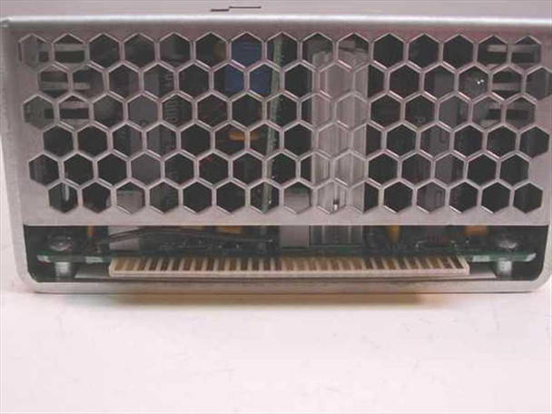 Tectrol TC53S-1195 power supply — rear edge connector and hexagonal vent grille detail view