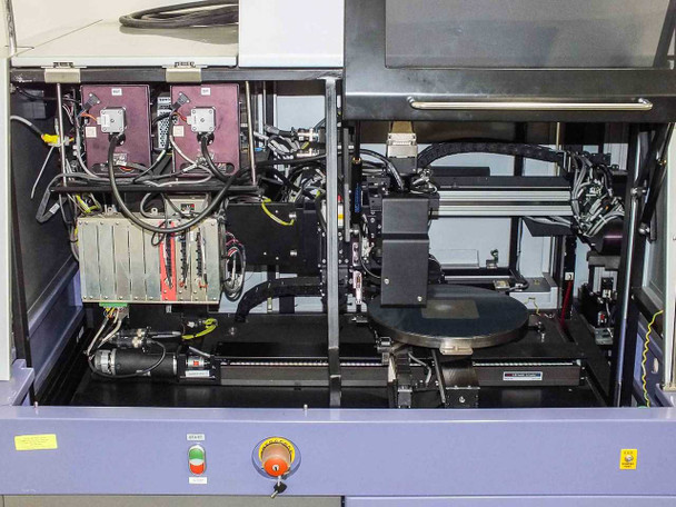 Camtek Falcon PD interior – open main cabinet showing wafer chuck stage, optical head assembly, REF and DIF detector modules, and motion subsystem