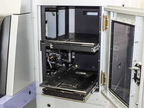 Camtek Falcon PD – auxiliary enclosure interior showing two-tier slide-out optical/mechanical subassembly trays