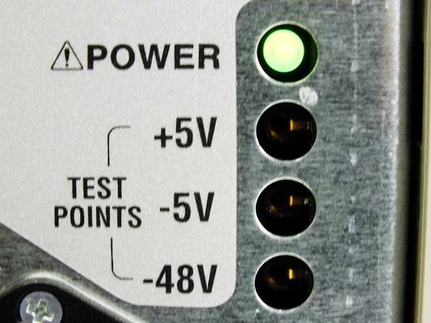 Avaya Merlin Magix 515A power module closeup showing POWER indicator LED (illuminated green), +5V, -5V, and -48V test points