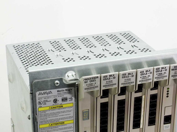 Avaya Merlin Magix 515A top and front view showing 491E1 power unit label (100-240V, 4A, 50-60Hz), Avaya logo, Caution/Attention labels, and module top edges