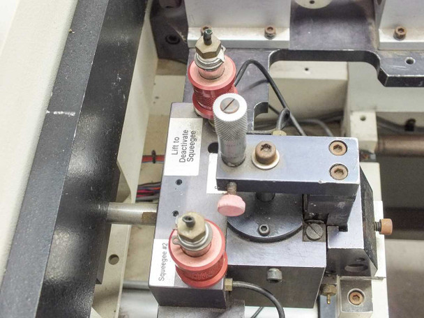HTI Engineering HT-2 – close-up of dual squeegee head assembly with Lift to Deactivate Squeegees label and red pressure adjusters