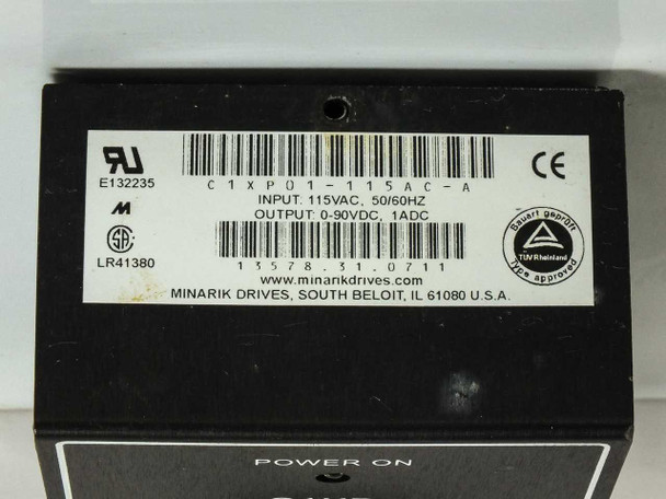 Close-up of Minarik C1XP01-115AC-A rating label showing INPUT 115VAC 50/60Hz and OUTPUT 0-90VDC 1ADC specifications