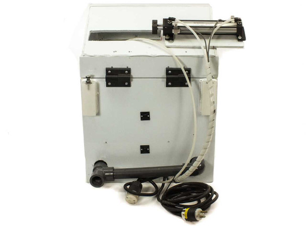 HDPE spin coating chamber rear view showing Norgren linear actuator assembly on top rail, power cord, drain tube, and rear panel hardware
