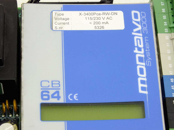 Montalvo System 3000 CB64 module close-up showing specification label with Type X-3400Pce-RW-DN, Voltage 115/230 V AC, Current less than 200 mA, CE mark, and LCD display