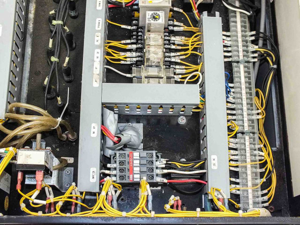 Orion AP-1500MVK-CS interior showing transformer, bus bars, terminal strip wiring, and distribution blocks