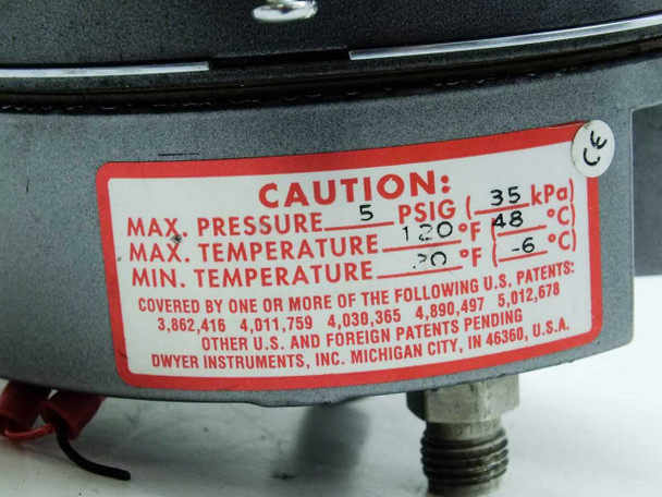 Dwyer 605-10C Magnehelic Transmitter — caution label showing max pressure 5 PSIG (35 kPa), max temperature 120°F (48°C), min temperature 20°F (-6°C), CE mark, and Dwyer Instruments Michigan City IN