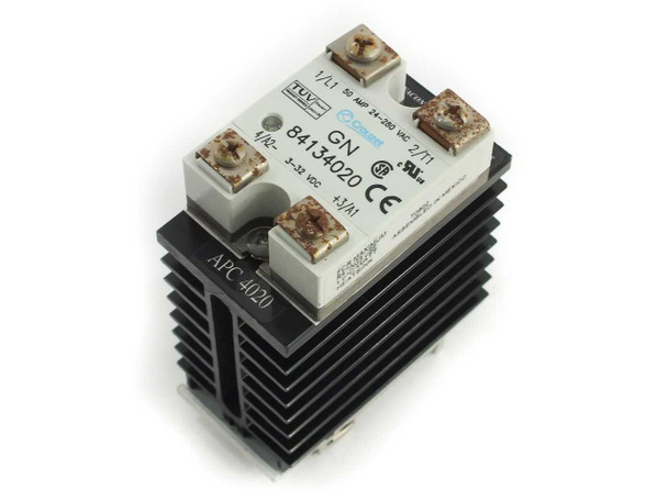 Crouzet GN 84134020 50A solid state relay mounted on Anacon APC4020 heatsink with DIN rail bracket — front label view showing ratings