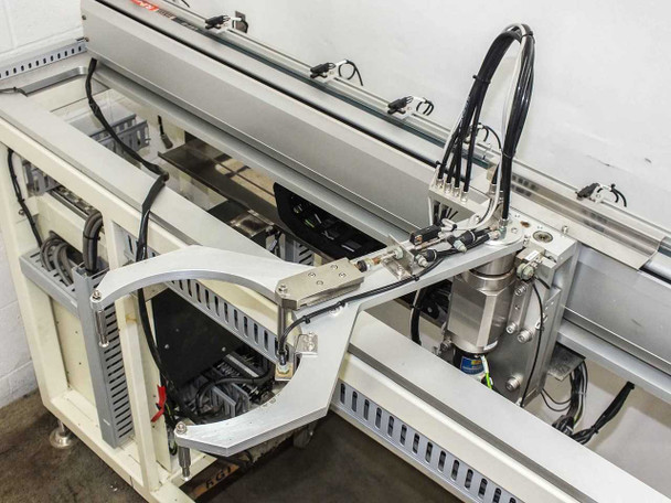 Yamaha LSII-B FLIP-X robot carriage and arm assembly close-up — top-down view showing cable track and actuator