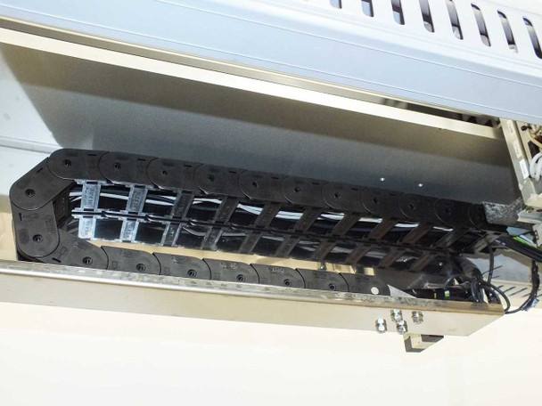 Interior cable track (energy chain) detail — showing bundled cables routed through chain links