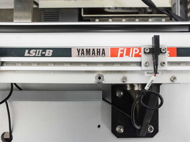 LSII-B and Yamaha FLIP-series decals on linear rail — with limit switch and sensor bracket visible