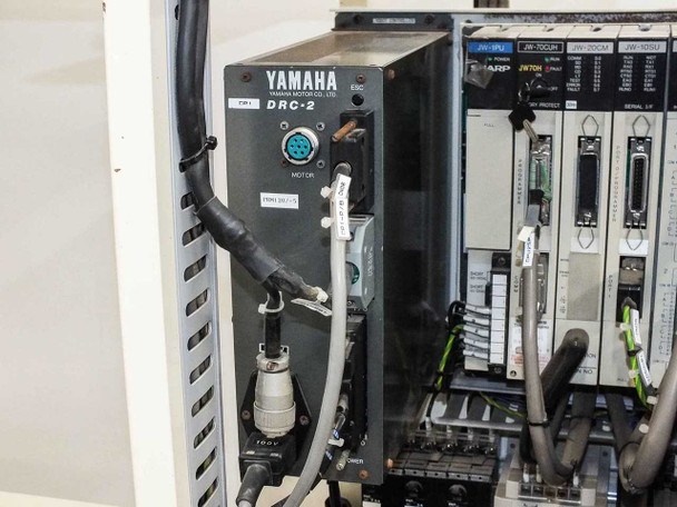Yamaha DRC-2 controller close-up — front panel with motor connector, power switch, and indicator lights