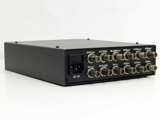 Cidtec ICM7000FX1 rear panel angled view — 12 BNC signal ports labeled ERCout, FGTRIG, BLANKout, HDRout, SYNCout, VDRout, SPout, STROBE, PIPin, HDRin, SYNCin, VDRin, plus IEC AC inlet
