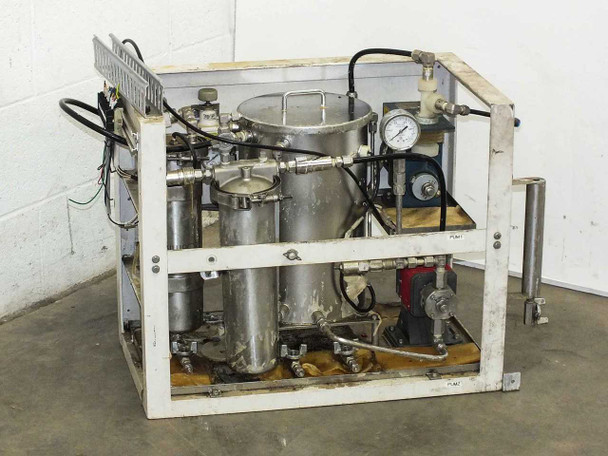 Lacquer dispensing system overall front-left view showing stainless steel containers, plumbing manifold, and white painted steel frame