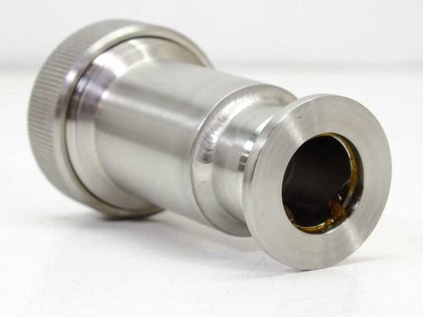 Vacuum pump bellows connector fitting – opposite angled side view showing smaller flanged end and interior bore with visible O-ring/seal