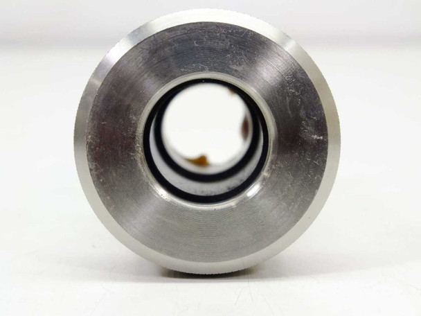 Vacuum pump bellows connector fitting – front face view showing 0.6875 inch small bore opening and machined aluminum flange with O-ring