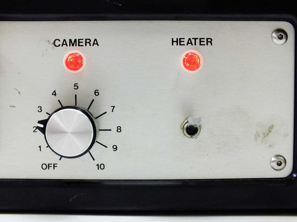 Dowty TC-48 front panel close-up — Camera rotary knob (OFF to 10) with red LED indicator lit, Heater red LED indicator lit, toggle switch