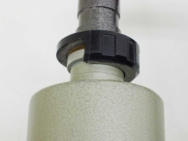 Edwards Changeover Valve — bottom port detail showing black locking collar and light grey cast body connection fitting