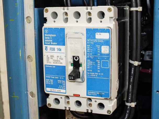 Westinghouse Series C FDB14k 25A 3-pole industrial circuit breaker inside cabinet panel