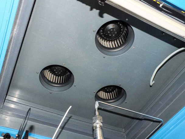 Interior top view of MOCVD cabinet showing four centrifugal blower fans for exhaust and cooling