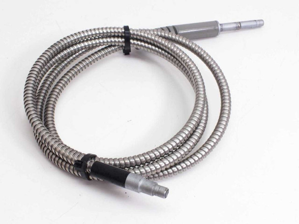 Lumatec fiber optic microscope light guide full length view laid out coiled on white surface, both barrel connectors visible, stainless armor jacket with black cable-tie holders