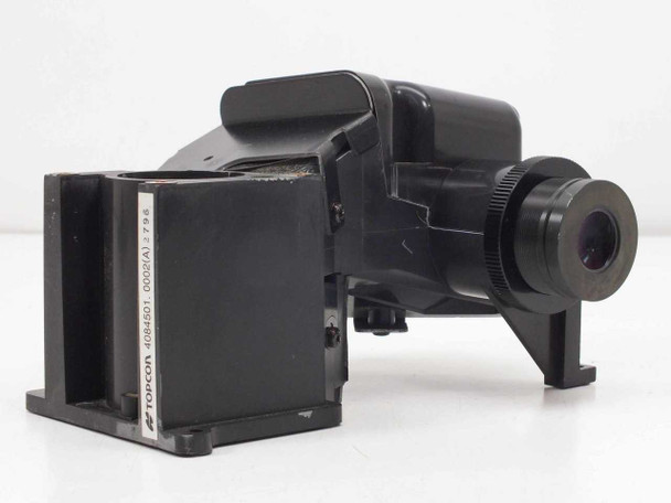Topcon 4084501 0002A Plastic Lens Assembly – left side view showing Topcon label and eyepiece lens