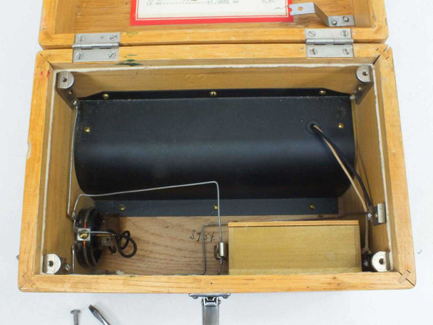 Leeds & Northrup 1138212 MTR — interior bottom compartment of wooden case showing cylindrical component, wiring, and two loose screws