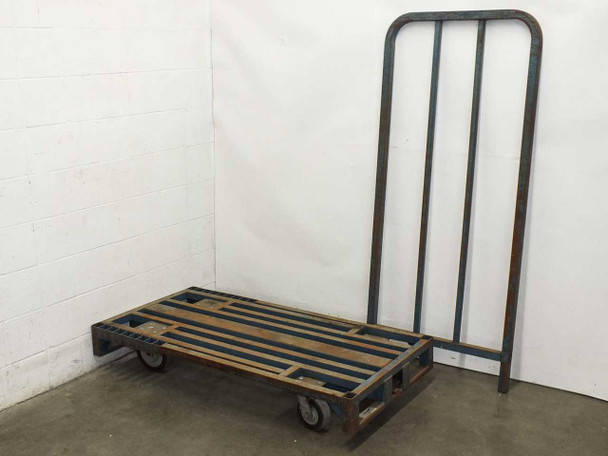 Cost Cutter industrial cart with removable upright backboard leaned separately against wall, showing cart platform and 4 casters