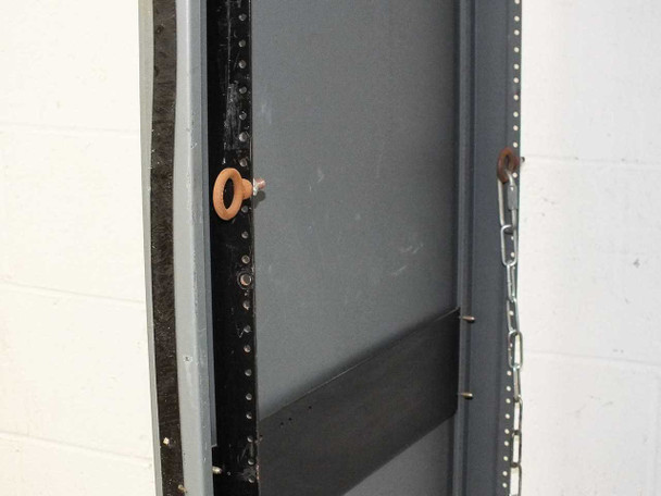 Interior side view of rackmount cabinet showing chain latch mechanism and key ring on the left rail