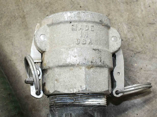 Aluminum cam lock coupling stamped MADE IN USA — close-up of casting