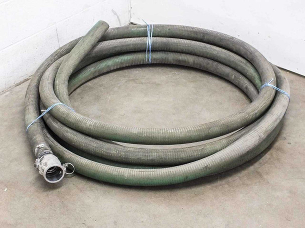 2-inch x 50 ft flexible transfer hose coiled on floor with aluminum cam lock coupling visible at one end