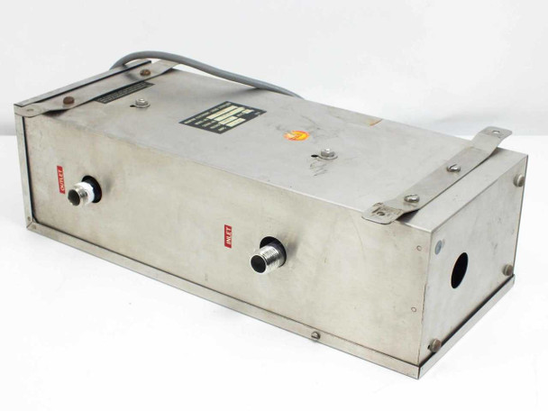 Aquafine SL-10A UV Liquid Sterilizer – front-left angled view showing stainless steel enclosure, inlet and outlet fittings with red labels, and top-mounted control module with power cord