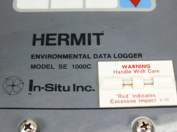 In-Situ HERMIT SE 1000C front panel label showing model number SE 1000C, In-Situ Inc. branding, and Handle With Care impact warning sticker