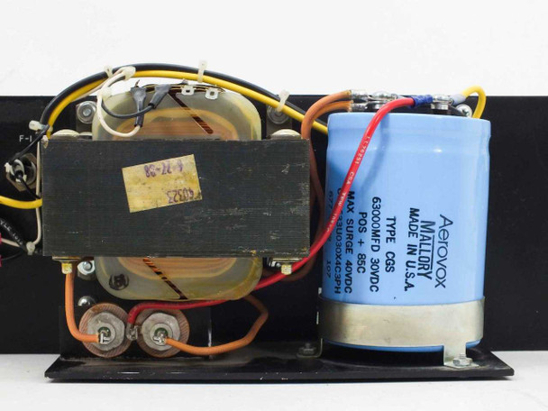 Close-up of Mallory Aerovox CGS capacitor label reading 63000MFD 30VDC Type CGS Made in USA and transformer with handwritten notation