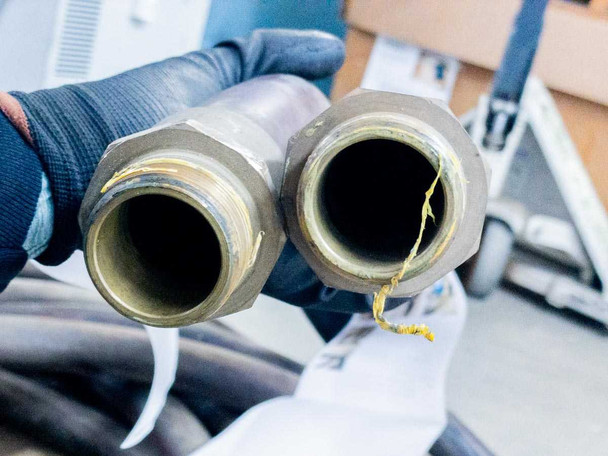 End-on view of both Dixon R125BB fittings showing 1.25-inch bore and threaded male ends