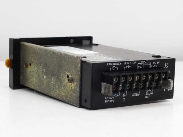 Iwaki FE-110 Single Inverter — angled front-left view showing terminal strip with Frequency, Run/Stop, Input DC 5V, Motor, and Alarm Out labels, with AC100V 50/60Hz marking
