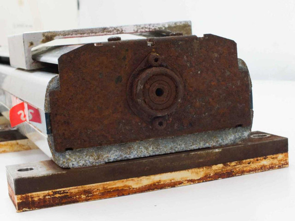 Yamaha LS1BL-850 end plate showing heavy surface rust and corrosion on metal mounting bracket and bearing housing