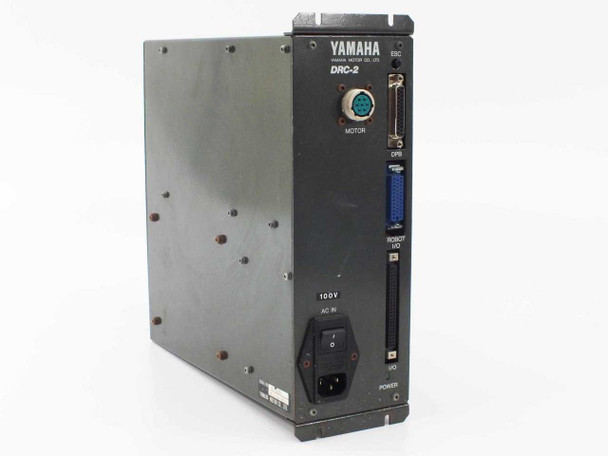 Yamaha DRC-2 robot motor controller side panel showing ESC, DPR, Robot I/O, and I/O connectors; 100V AC IN IEC inlet and MOTOR connector on front; POWER switch at bottom