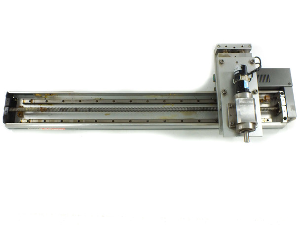 Yamaha LS1BL-750 linear slide top cover removed showing ball screw drive mechanism and Sanyo Denki L404 motor mounted at right end