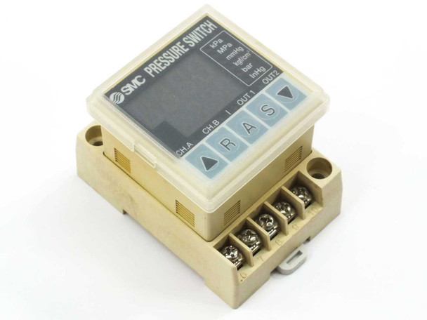 SMC PSE100-B DIN rail pressure switch front panel showing digital display, CH.A CH.B channel indicators, R A S V buttons, and OUT1 OUT2 indicators