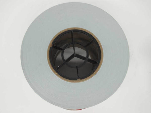 Madico Protekt TFB HD 10 W/W PV Backsheet — single roll top-down view showing gray film surface and black plastic core